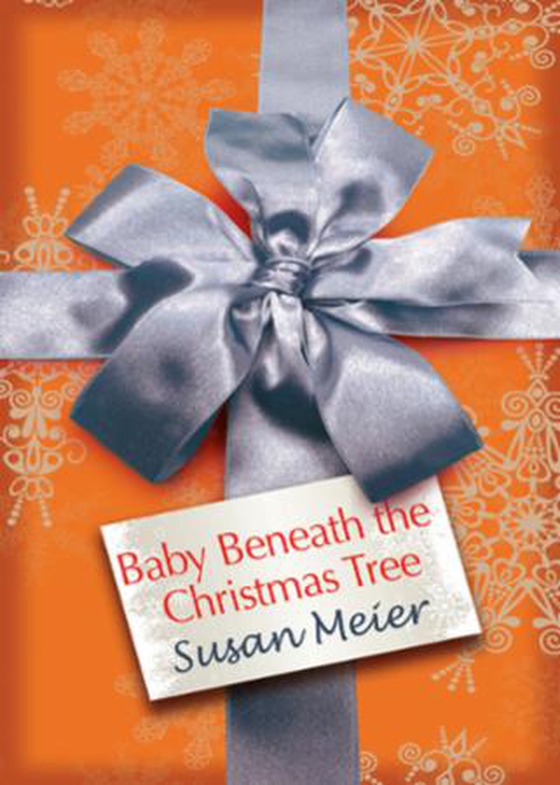 Baby beneath the christmas tree
